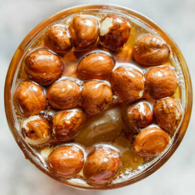 Honey nuts. mixed nuts in honey. syrup